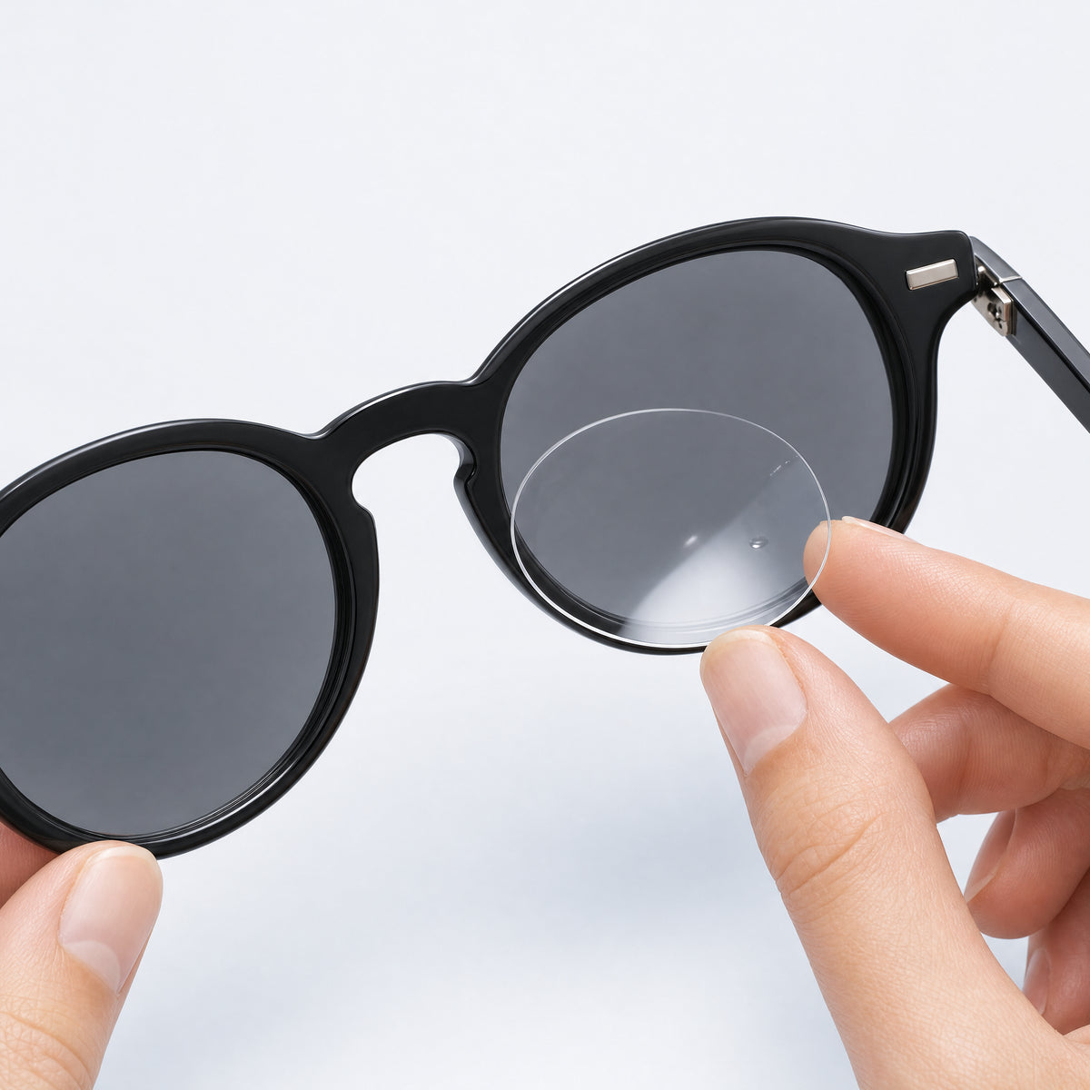 Illustration of water application on the inner surface of a compatible eyewear lens.